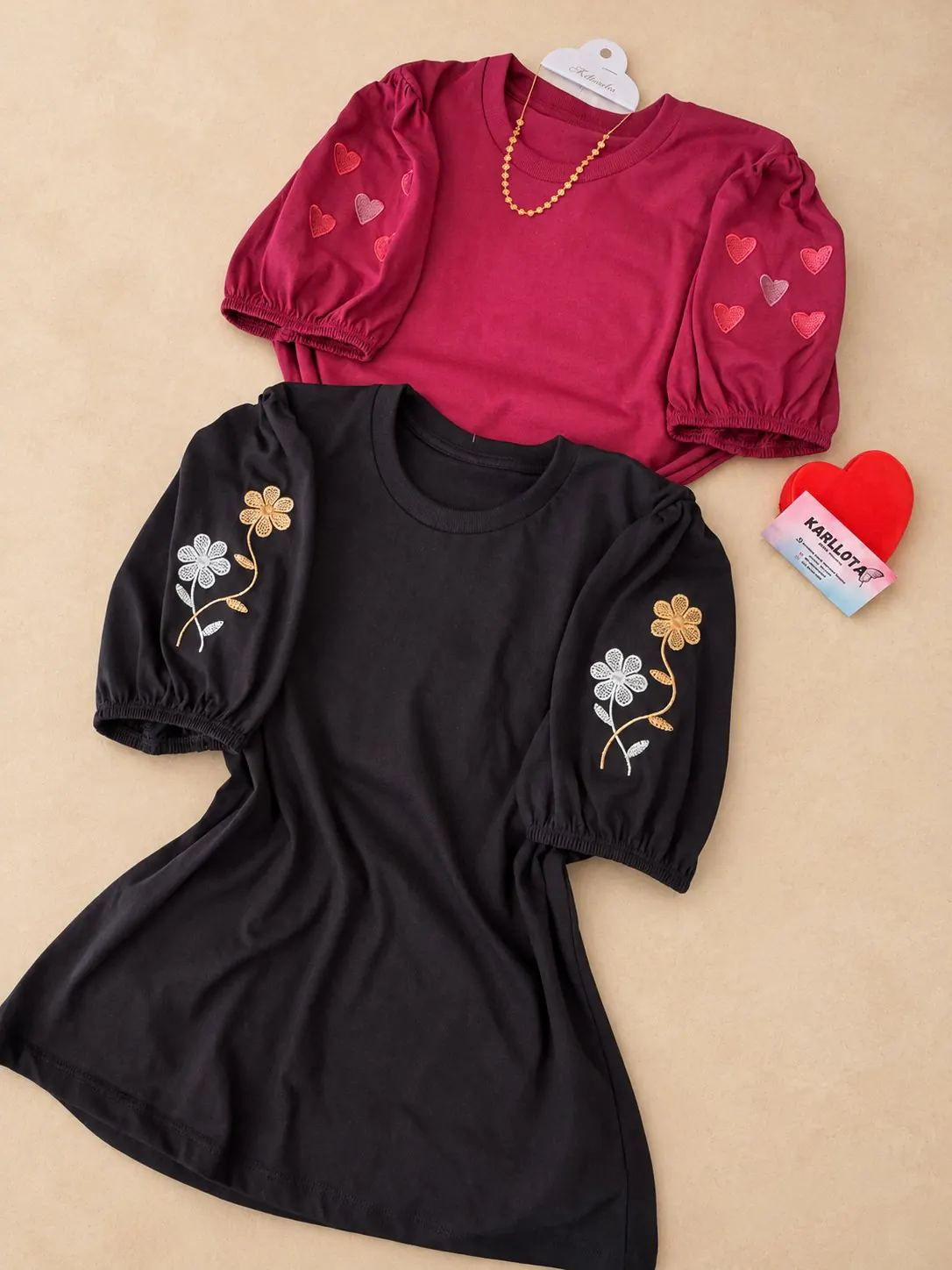 Blusas de algodão bordadas Plus nas cores vinho e preta, com mangas bufantes.